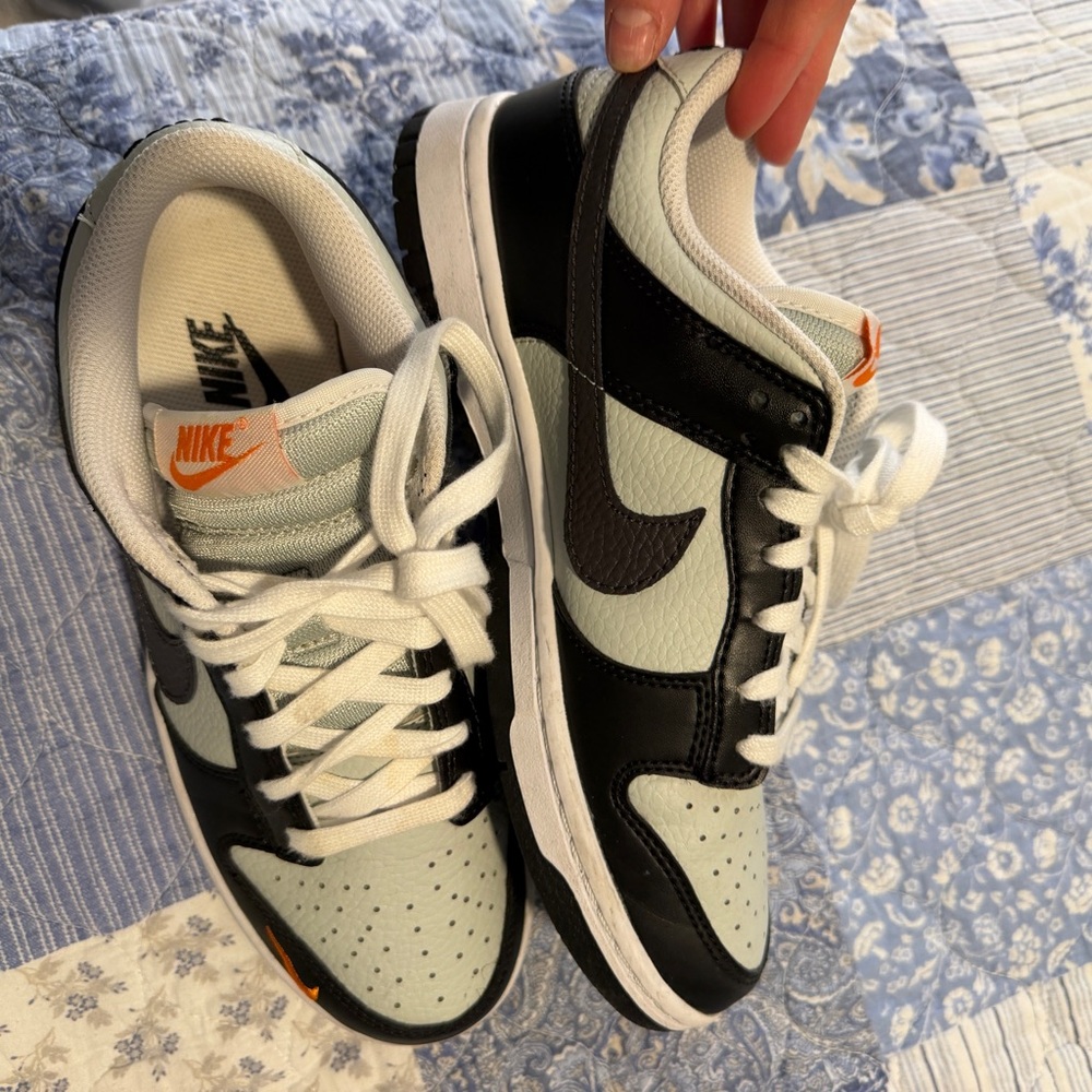 Nike White Low-Top Sneakers with Orange Accent